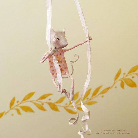 Decorative pink mobile with circus mouse made of papier-mâché