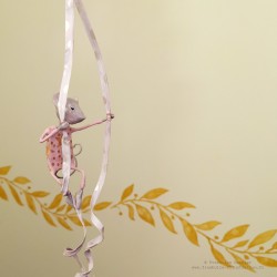 Decorative pink mobile with circus mouse made of papier-mâché