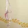 Decorative pink mobile with circus mouse made of papier-mâché